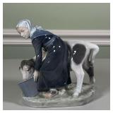 Royal Copenhagen Milkmaid | Milkmaid and cow, no. 779 on the bottom Dimensions: l. 7 x h. 6 in 