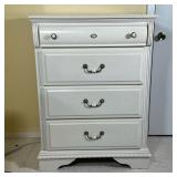 White Painted Tall Chest | Having four full width drawers with ceramic pulls Dimensions: l. 32 x w. 