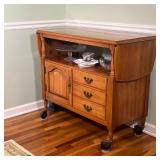 Wood Bar Cart / Side Table | Open shelf over three drawers and a cabinet door, with flip top sides, 