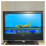 Toshiba 26" TV | 26 inch flat screen TV with built-in DVD player, model 26HLV66 Dimensions: w. 26 x 