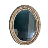 BOMBAY OVAL WALL MIRROR | Fancy carved framed mirror with gilt accents Dimensions: w. 26 x h. 33 in 