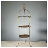 COPPER STAND | Three tiered copper stand with scalloped edges and a heart form carrying handle, on t