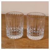 PAIR BACCARAT LOW BALL GLASSES | Very good condition both signed on the bottom Dimensions: h. 4 x di
