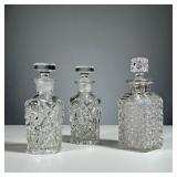 (3PC) CUT GLASS PERFUME BOTTLES | Including a pair of round bottles and a single bottle, each with a