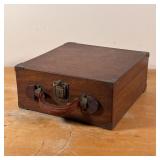 ANTIQUE WOODEN CASE | With brass corners and latch and a leather carrying handle Dimensions: 5 x 11 