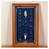 FRAMED MINIATURE ANCHORS | Original anchor display of historical anchor types, and with sailor knots