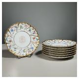 (7PC) DESSERT PLATES | Floral decoration with gilt edges. 