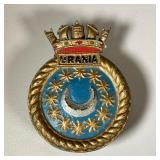 CAST IRON SHIPS BADGE | Painted cast iron ship badge with the name “Urania”. dia. 6 in 