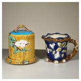 (2PC) CERAMICS | Including a Majolica cheese keeper by Seymour Mann and a Majolica pitcher with flow