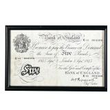 1945 ENGLISH FIVE POUND NOTE | Framed with Robert Johnson Coin Co. on verso; l. 8.75 x h. 5.5 in 