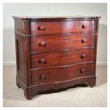 MAHOGANY-VENEER ANTIQUE BUREAU | Antique serpentine dresser with turned round handles and 4 drawers.