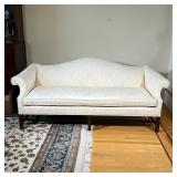 WHITE CAMELBACK SOFA | Chippendale style camelback cushioned white couch with floral designed uphols