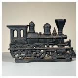 STEAM ENGINE DOORSTOP | Cast iron doorstop shaped like a locomotive. - l. 10 x h. 6.5 in 