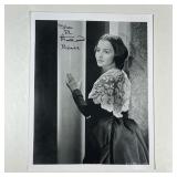 [AUTOGRAPH] OLIVIA DE HAVILLAND | Olivia de Havilland. An excellent 8 X 10 signed photograph as Mela