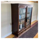 GLAZED BOOKCASE CABINET | With shelves 11 inches deep adjustable height, having two glazed doors ove