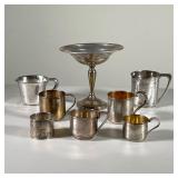 (8PC) STERLING SILVER ITEMS | Including six variously sized child’s cups (11.3 oz together approxima