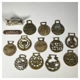 GROUP OF HORSE & OTHER BRASSES | Including horse brasses, awards of merit, and other badges, plus tw