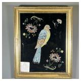 19TH C. TINSEL WORK | Victorian tinsel work of a bird among flowers in a gilded frame.