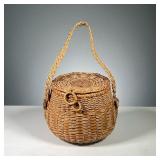 SELITZ BASKET | Antique handwoven basket with woven strap. Dimensions: h. 5.5 x dia. 7 in (basket on