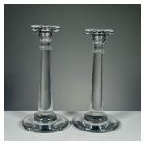(2PC) PAIR GLASS CANDLESTICKS | Pair of eloquent blown glass candlesticks. Dimensions: h. 9.5 x dia.