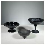 (3PC) ASSORTED BLACK BOWLS | Various black glass and ceramic bowls, including two compotes and a mol