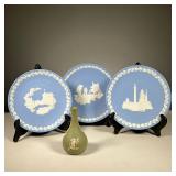 (4PC) WEDGWOOD PLATES AND BUD VASE | Includes: Olive & White bud vase with Cupid reliefs. As well as