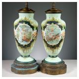 (2PC) PAIR PAINTED CERAMIC LAMPS | Each decorated with hand-painted scenes with an angel and baby, o