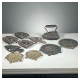 (11PC) CAST IRON TRIVETS & IRON HOLDERS | Includes: 4 cast iron trivets, 6 iron holders from various