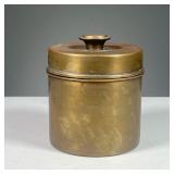 BRADLEY & HUBBARD BRASS TOBACCO JAR | Brass tobacco jar with glass insert. Dimensions: h. 5 x dia. 3