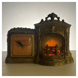 UNITED CLOCK CORP WHITE METAL CLOCK | Brass plated white metal clock with glowing fireplace light Di