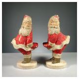 (2PC) PAIR PLASTER SANTA MODELS | Pair of plaster Santa figures with small shelf and notch in the ba