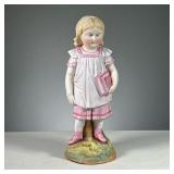 PORCELAIN SCHOOLGIRL FIGURE | Marked with an “R” on the bottom. Dimensions: h. 12.5 in