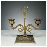 BRASS NEPTUNE CANDLEHOLDER | Brass candelabra featuring trident in the middle with fish and sea serp