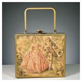 NEEDLEPOINT HANDBAG | Antique needlepoint and brass handbag, showing a courting scene in cushioned r