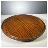 WOODEN LAZY SUSAN | Wooden lazy Susan with carved lip around the border. Dimensions: dia. 16 in All 