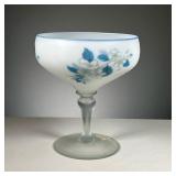 PHOENIX GLASS COMPOTE | White glass compote with blue rim and floral decoration painted around bowl,