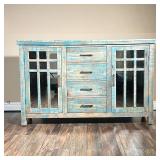 CABINET IN DISTRESSED BLUE FINISH | Wood cabinet with two mirrored cupboard doors each with one shel