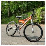 MONGOOSE XR-75 CHILD’S BICYCLE | Full suspension, with Shimano components, 21 speed.