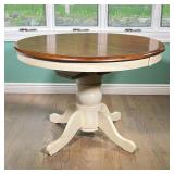 KITCHENETTE DINING TABLE | A small round white painted pedestal kitchen, or eat-in kitchen, table- w