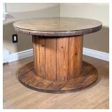 RUSTIC SPOOL TABLE | Wooden spool form table with a custom glass top. - h. 26 x dia. 40 in