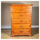 NEW CLASSIC HOME FURNISHINGS DRESSER | Dark wood dresser with lift top and interior mirror, four dra