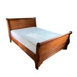 FULL-SIZE WOOD BED FRAME | Carved wood bed frame complete with headboard and footboard (most likely 