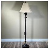 TALL METAL FLOOR LAMP | Tall heavy metal floor lamp with leaf-pattern on base. Painted with dark red