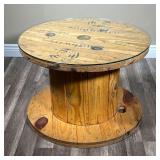 RUSTIC SOUTHWIRE SPOOL TABLE | Rustic wire spool form table painted with company logo and name “Sout