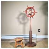 (2PC) MISC. DECOR | Including a small free spinning ship wheel on wooden stand and small children’s 