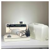 SINGER MODEL 1280 SEWING MACHINE | Appears in very good condition, with cover.