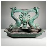 ANTIQUE CAST IRON BOOT SCRAPER | Decorated with dolphins (fish) and a central seashell and with old 