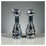 (2PC) CARROL BOYES PEWTER VESSELS | Polished pewter man and woman figural bottles, likely for olive 