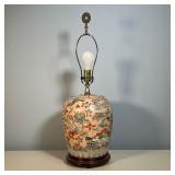 CHINESE LAMP | Lidded jar with a salmon ground decorated with ducks and goldfish, mounted to a wood 