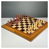 FOLDING WOODEN CHESS SET | Magnetic closure Carved wood pieces. - l. 16 x w. 8 x h. 2 in (folded)